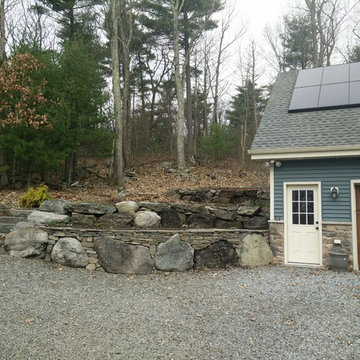 Semi-Dry laid retaining wall on exisiting boulders