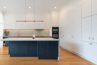 Photo of a mid-sized kitchen in Melbourne.