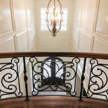 Project #74 | Circular Staircase with Hand-Forged Metal Panels