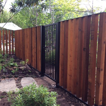 Vertical Wood Fence with Metal Frame