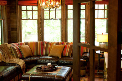Example of a mountain style family room design in Minneapolis