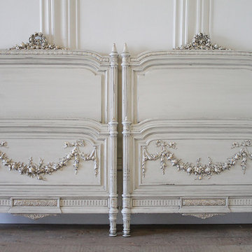 Pair of 20th Century Carved Painted Louis XVI Style French Beds with Rose Swags