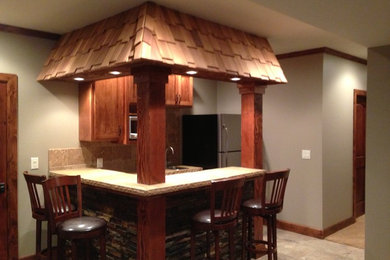 Inspiration for a craftsman basement remodel in Kansas City