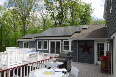 Mid-sized elegant backyard outdoor kitchen deck photo in Bridgeport with no cover