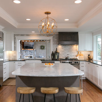 Kitchen with large island and vaulted ceiling