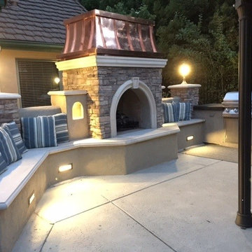 Custom Copper Temptress Atop An Outdoor Fireplace