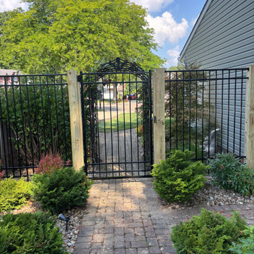6' Ornamental Aluminum Black Fence installed on 6x6 treated pine posts