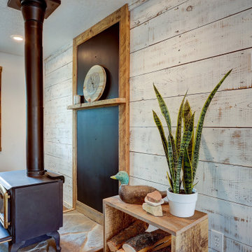 Modern Farmhouse with Fireplace and White Washed Barn Wood Wall