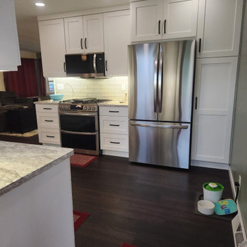 Modern Kitchen Transformation Done in New Classic White Cabinets