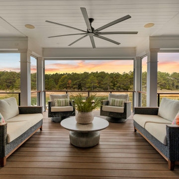 Second-Story Deck Featuring Panoramic Water View