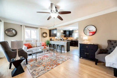 Example of a transitional living room design in Detroit