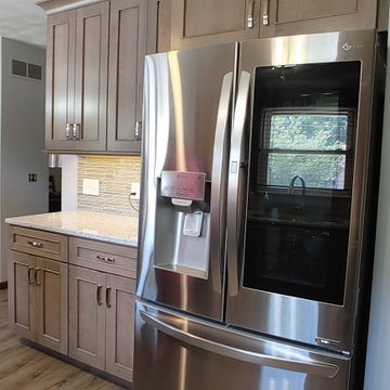 Moline Kitchen & Baths Remodel-Dura Supreme Cherry Hanstone Fusion Onyx