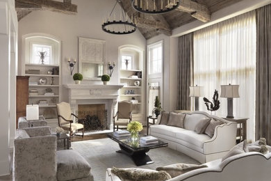 Large elegant formal and open concept dark wood floor and brown floor living room photo in St Louis with white walls, a standard fireplace, a plaster fireplace and no tv