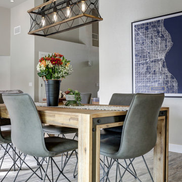 The designer client selected a rustic table of metal and warm wood tones.