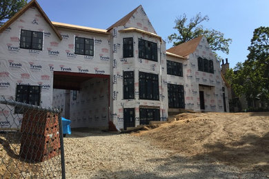 Home design - large traditional home design idea in Chicago