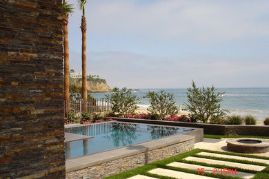Inspiration for a contemporary pool remodel in Orange County