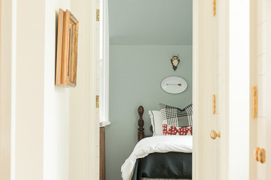 Example of a transitional bedroom design in Chicago