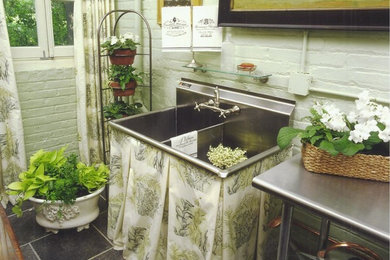 Farmhouse tile patio photo in Other
