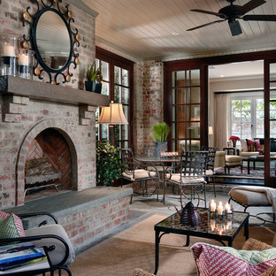 Wintergarten mit Schieferboden und Kamin Ideen, Design & Bilder