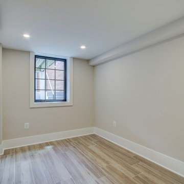 Basement remodeled with bedroom space and extra closet space in Vienna