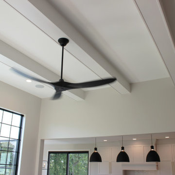 Oak, and White Kitchen with Matte Black Accents in Iowa Aspen Homes Farmhouse