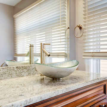 Elegant Master Bathroom Remodel with Quartz-Granite Hybrid Vanity and Spa Shower