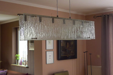 Example of an eclectic home design design in Other