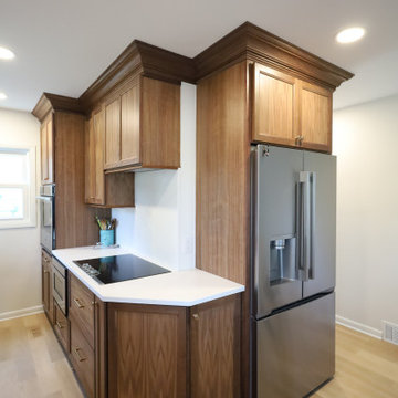 Rich & Refined: Custom Walnut Kitchen Remodel with White Quartz & Oak Flooring