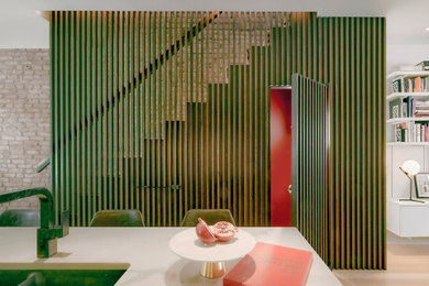 Mid-sized trendy wooden straight wood railing staircase photo in New York with wooden risers
