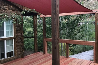 Mountain style deck photo in Denver