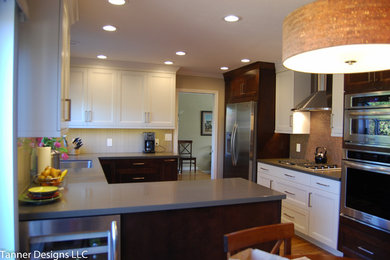 Example of a mid-sized transitional u-shaped light wood floor open concept kitchen design in San Francisco with an undermount sink, recessed-panel cabinets, white cabinets, quartz countertops, multicolored backsplash, mosaic tile backsplash, stainless steel appliances and a peninsula