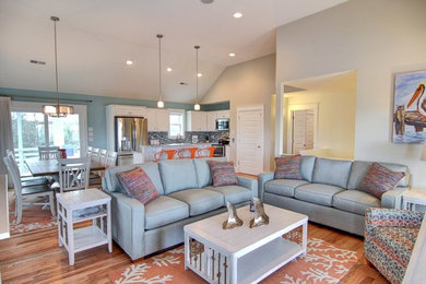 Example of a beach style home design design in Other