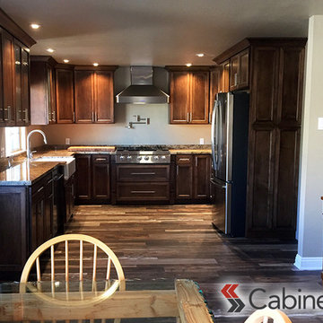 Beautiful Dark Kitchen featuring Belleair Maple Pecan Cabinetry