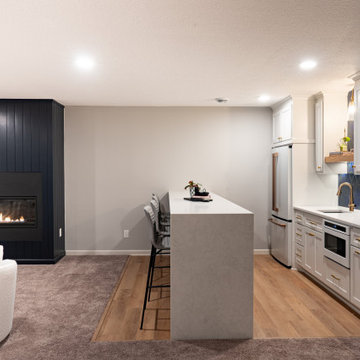 Bold Basement Finish — Linear Gas Fireplace, Wet Bar & Cafe Appliance Suite