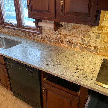 12302 - Colonial White Leathered Granite Project