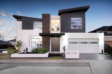 Design ideas for a large contemporary two-storey white house exterior in Melbourne with concrete fiberboard siding, a flat roof and a metal roof.