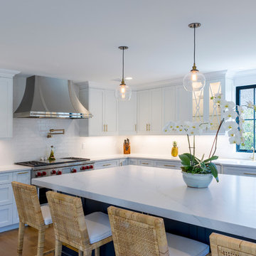 White Modern Kitchen with Compac Quartz Counters and Island