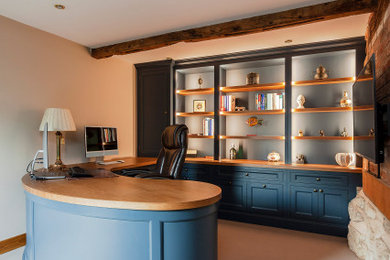 Medium sized contemporary study in West Midlands with a built-in desk.