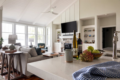 Beach style living room photo in Other