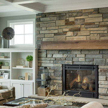 Rustic Stone Fireplace Illuminates This Traditional Living Room
