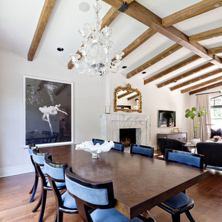 Large mediterranean open plan dining in Orange County with white walls and medium hardwood floors.