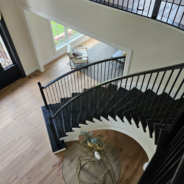 Project #130 | Curved Staircase with Wraparound Balcony