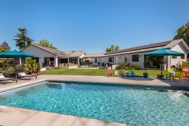 Inspiration for a large cottage backyard rectangular pool remodel in San Francisco