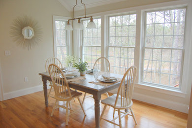 Example of a beach style dining room design in Providence