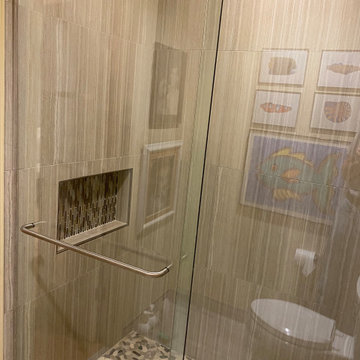MASTER BATHROOM - Tub-To-Shower 12" x 24" Gray Porcelain Tile Vertically Aligned