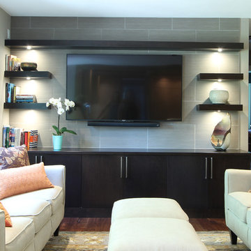 Modern Cherry Cabinets used in Family Room with Floating Shelves