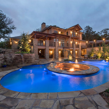 Multi-Level Pool with Rope Swing, Sunken Fire Pit, Waterfalls & Swim Up Bar