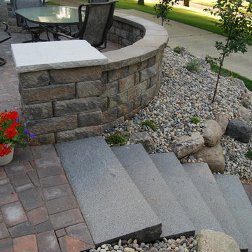 Granite steps alleviate grade change between house and garage