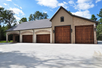 Inspiration for a mid-sized country multicolored one-story mixed siding gable roof remodel in Houston