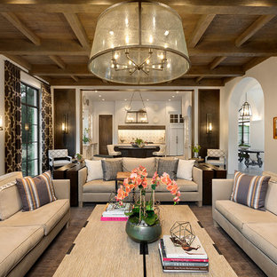 Diseño de salón abierto, mediterráneo, extra grande, con paredes blancas, suelo de piedra caliza y suelo gris